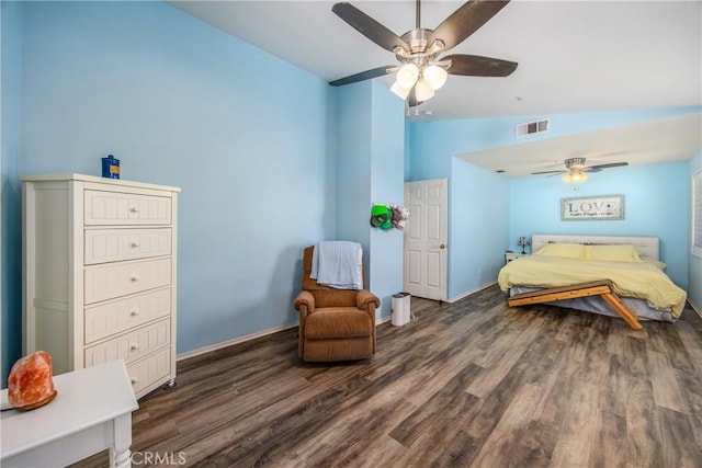 bedroom with ceiling fan, lofted ceiling, and dark hardwood / wood-style flooring