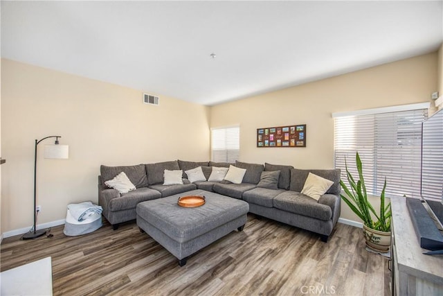 living room with hardwood / wood-style flooring