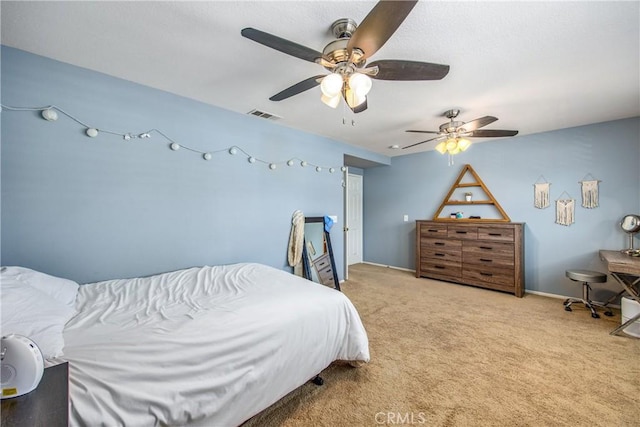 bedroom with light colored carpet and ceiling fan