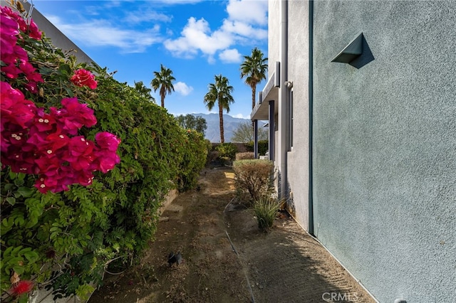 view of home's exterior featuring a mountain view