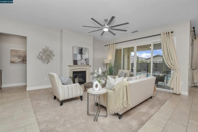 tiled living room with ceiling fan