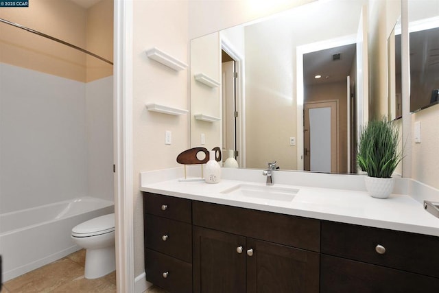 full bathroom with tile patterned flooring, vanity, shower / tub combination, and toilet