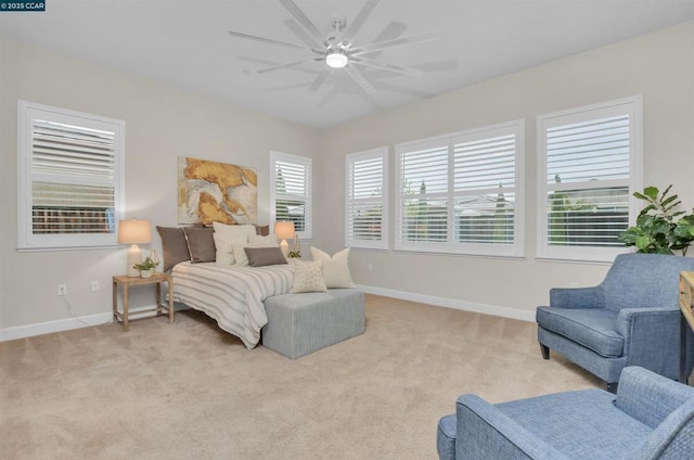 carpeted bedroom with ceiling fan