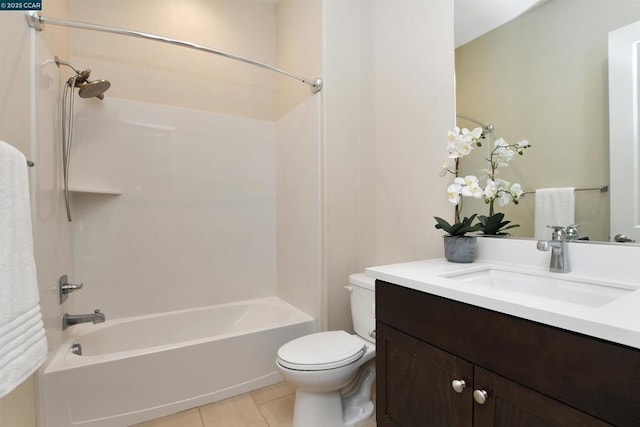 full bathroom with tile patterned flooring, vanity, tub / shower combination, and toilet