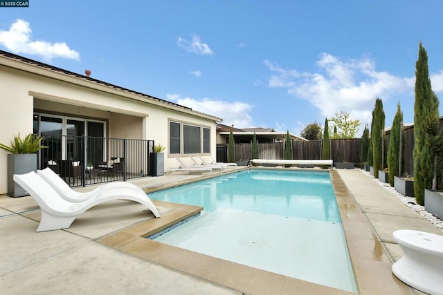 view of pool featuring a patio area