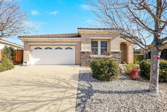 mediterranean / spanish-style home featuring a garage