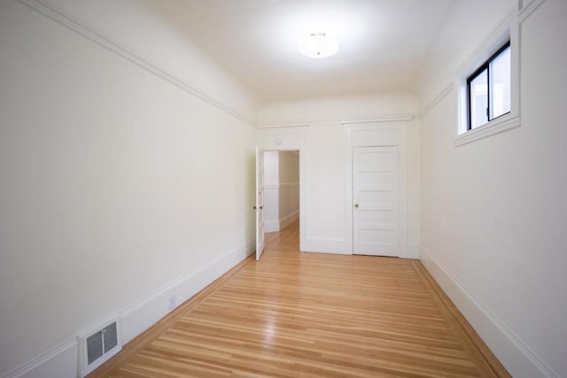 hallway featuring light wood-type flooring