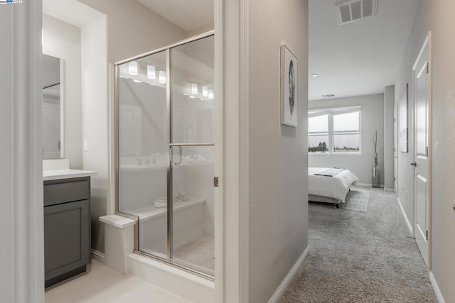 bathroom featuring vanity and walk in shower