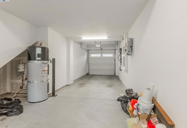 garage with strapped water heater