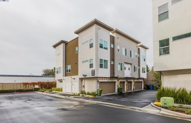 view of building exterior featuring a garage