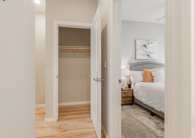 bedroom featuring hardwood / wood-style flooring and a closet