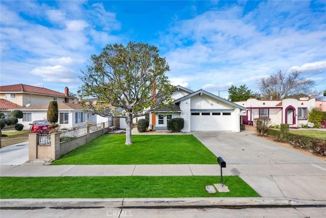 view of front of property with a garage and a front yard