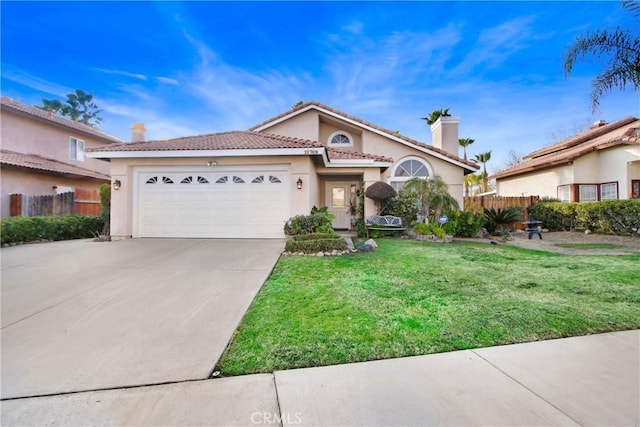 mediterranean / spanish-style house with a garage and a front lawn