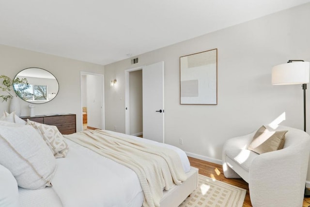 bedroom featuring hardwood / wood-style flooring