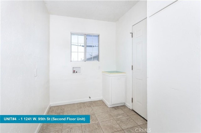 laundry area with cabinets and hookup for a washing machine