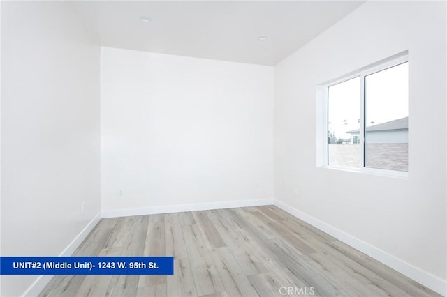 unfurnished room featuring light wood-type flooring