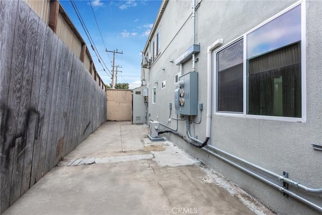 view of side of property featuring a patio area