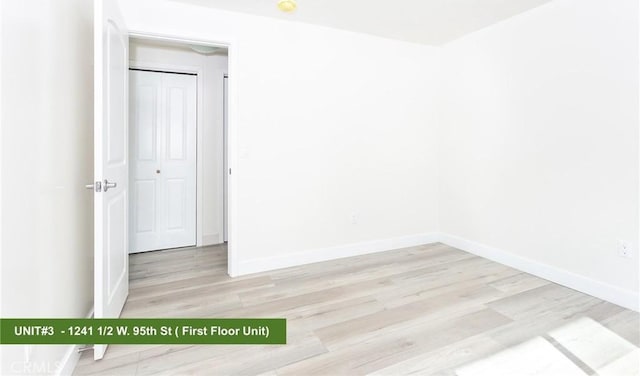 empty room with light hardwood / wood-style floors