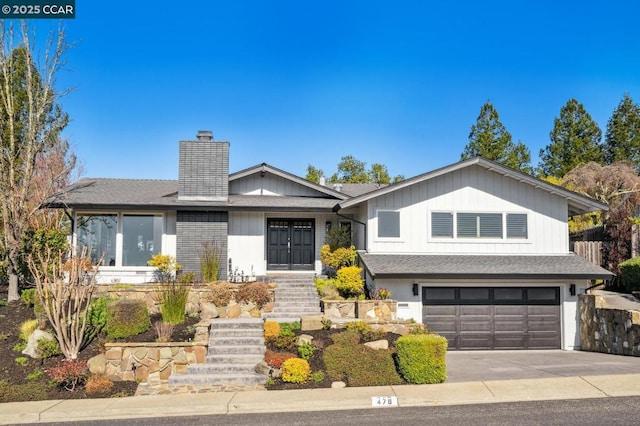 view of front of home with a garage