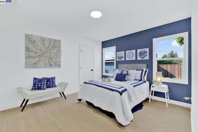 bedroom featuring wood-type flooring