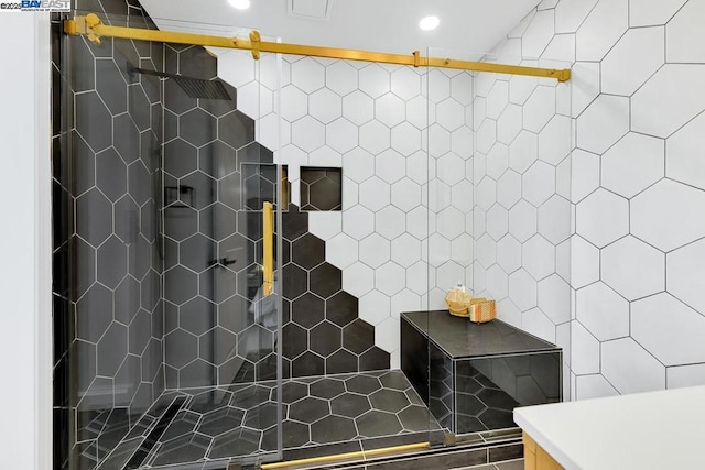 bathroom with tiled shower