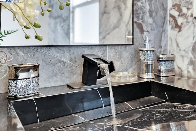 details with sink and decorative backsplash