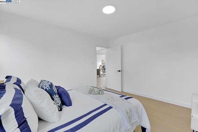 bedroom featuring hardwood / wood-style flooring