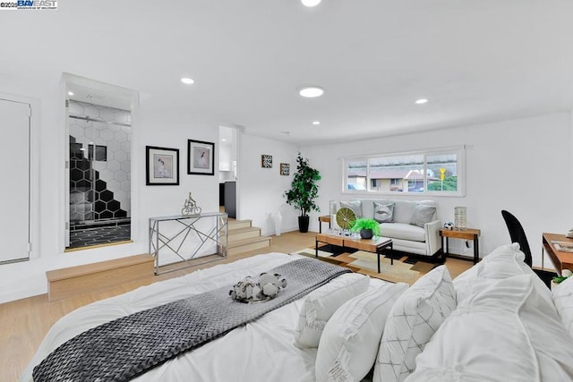 bedroom featuring hardwood / wood-style flooring