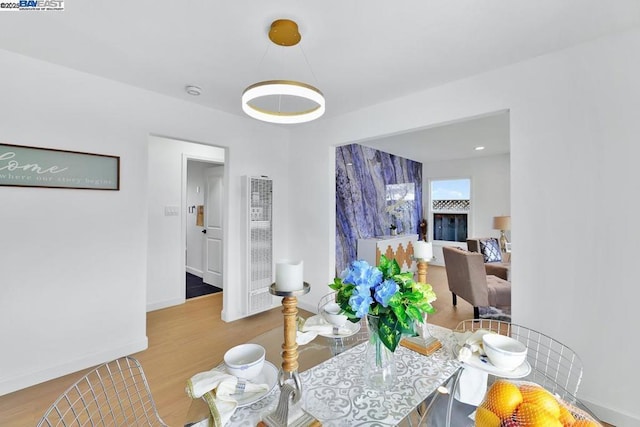 dining room with light wood-type flooring