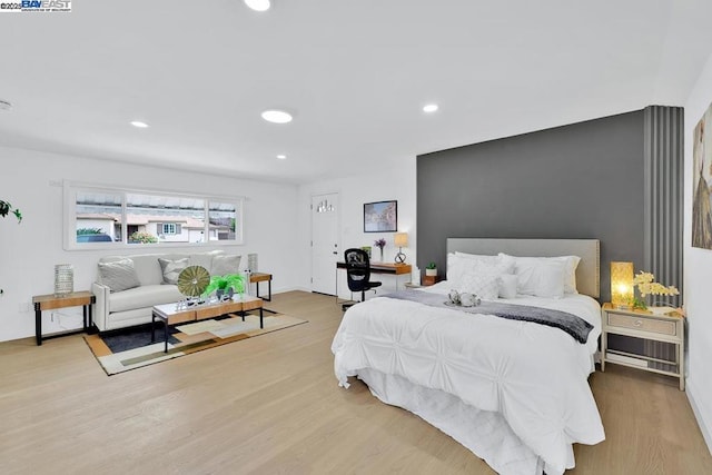 bedroom with wood-type flooring