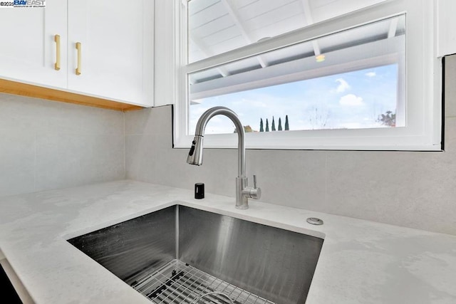 details with sink and white cabinets