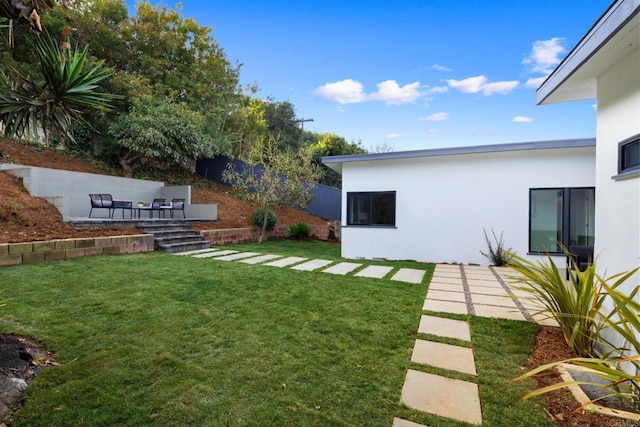 view of yard featuring a patio