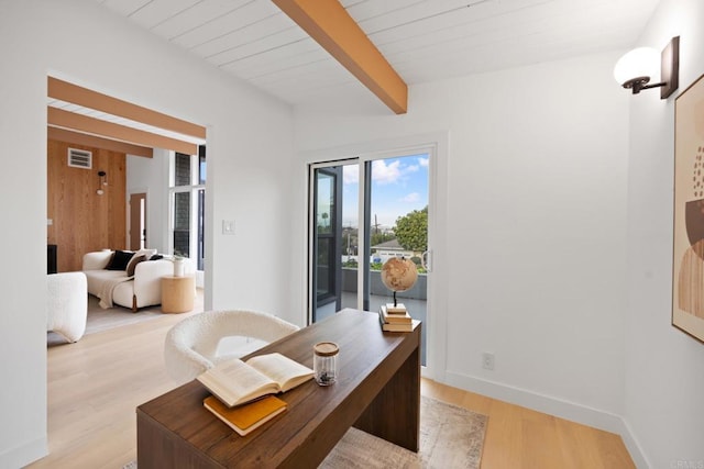 office featuring beam ceiling and light wood-type flooring