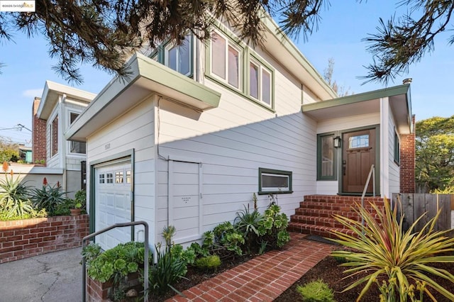 exterior space with a garage