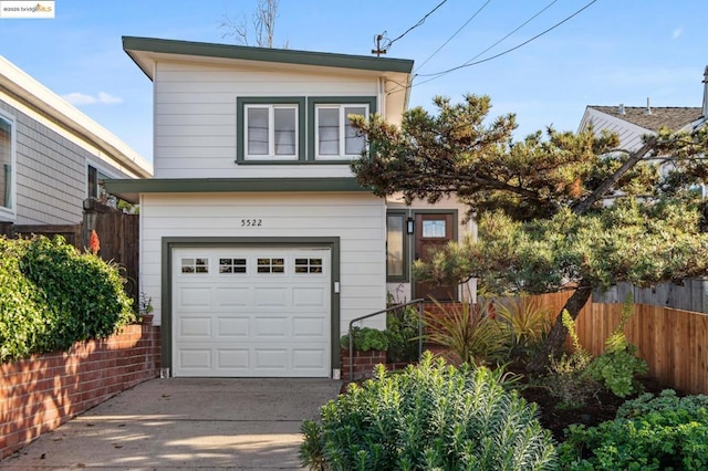 view of front of property with a garage