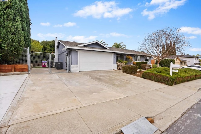 ranch-style home with a garage