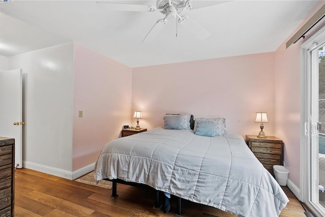 bedroom with hardwood / wood-style floors and ceiling fan