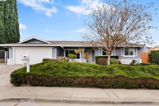 single story home featuring a garage