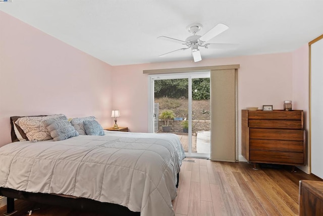 bedroom with ceiling fan, access to outside, and light hardwood / wood-style floors