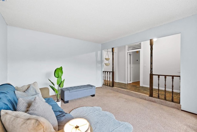 sitting room featuring light colored carpet