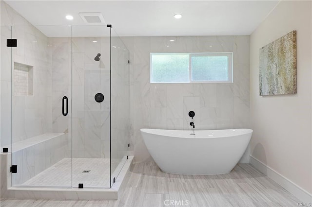 bathroom with independent shower and bath