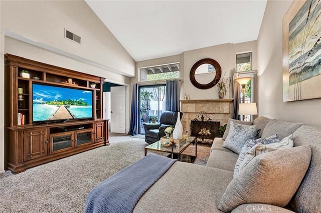 living room with high vaulted ceiling and carpet