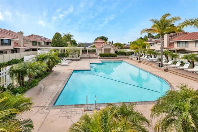 view of swimming pool with a patio