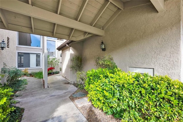 entrance to property with a patio