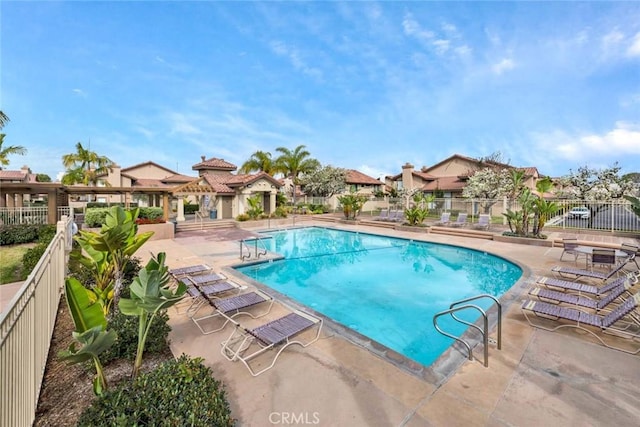 view of swimming pool featuring a patio