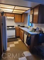 kitchen featuring white stove