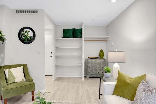 living area featuring light hardwood / wood-style flooring