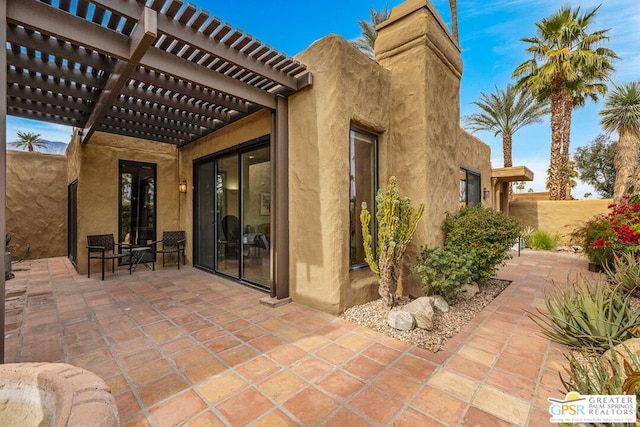 view of patio / terrace featuring a pergola