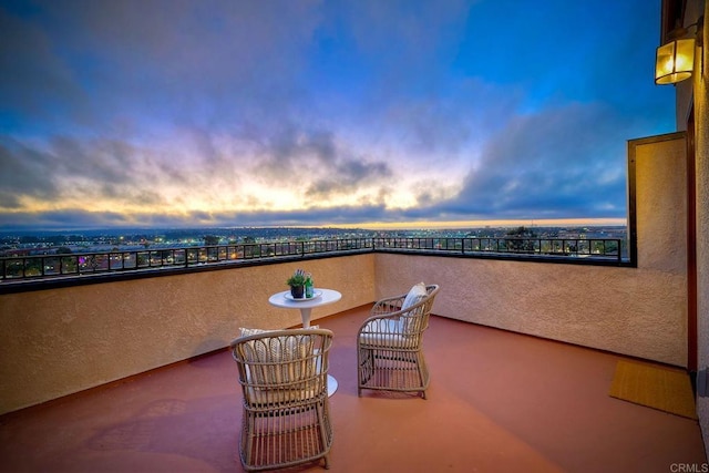 balcony at dusk with a patio