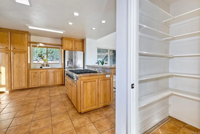 kitchen featuring light tile patterned floors, recessed lighting, and appliances with stainless steel finishes